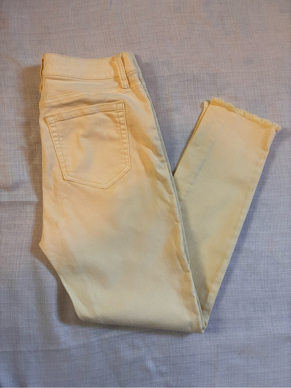 LOFT Pale Yellow Cropped Frayed Hem Jeans